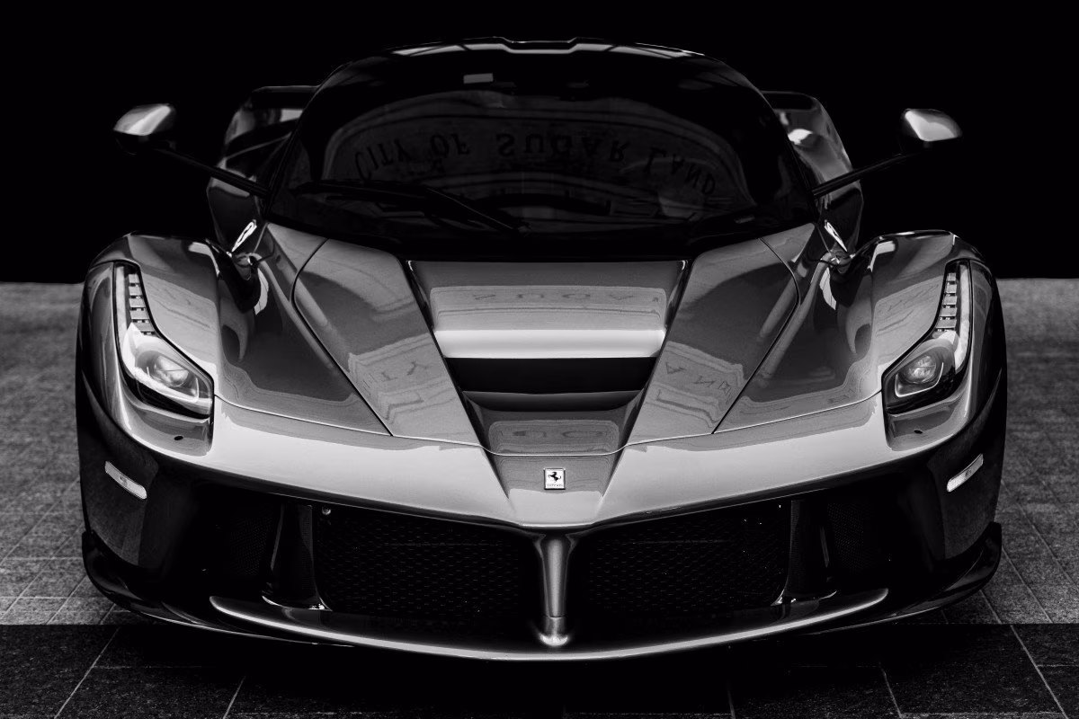 Front view of a black Ferrari LaFerrari, showcasing its aggressive design from Stockmark.it