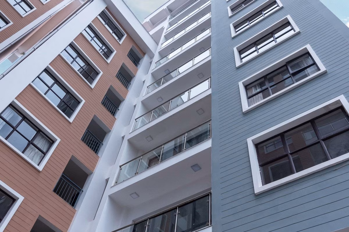 Modern apartment building in London with glass balconies and windows from Stockmark.it