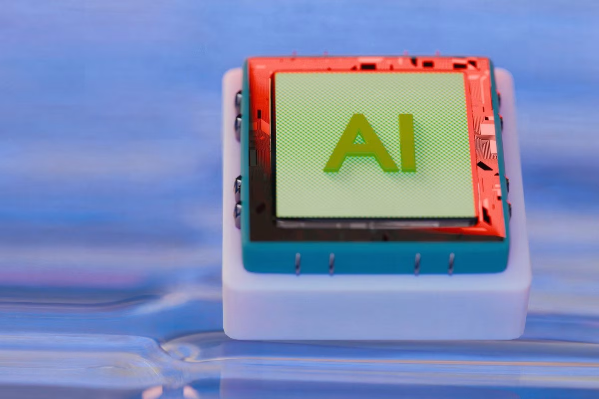 AI chip with a green screen, submerged in water, blue background from Stockmark.it