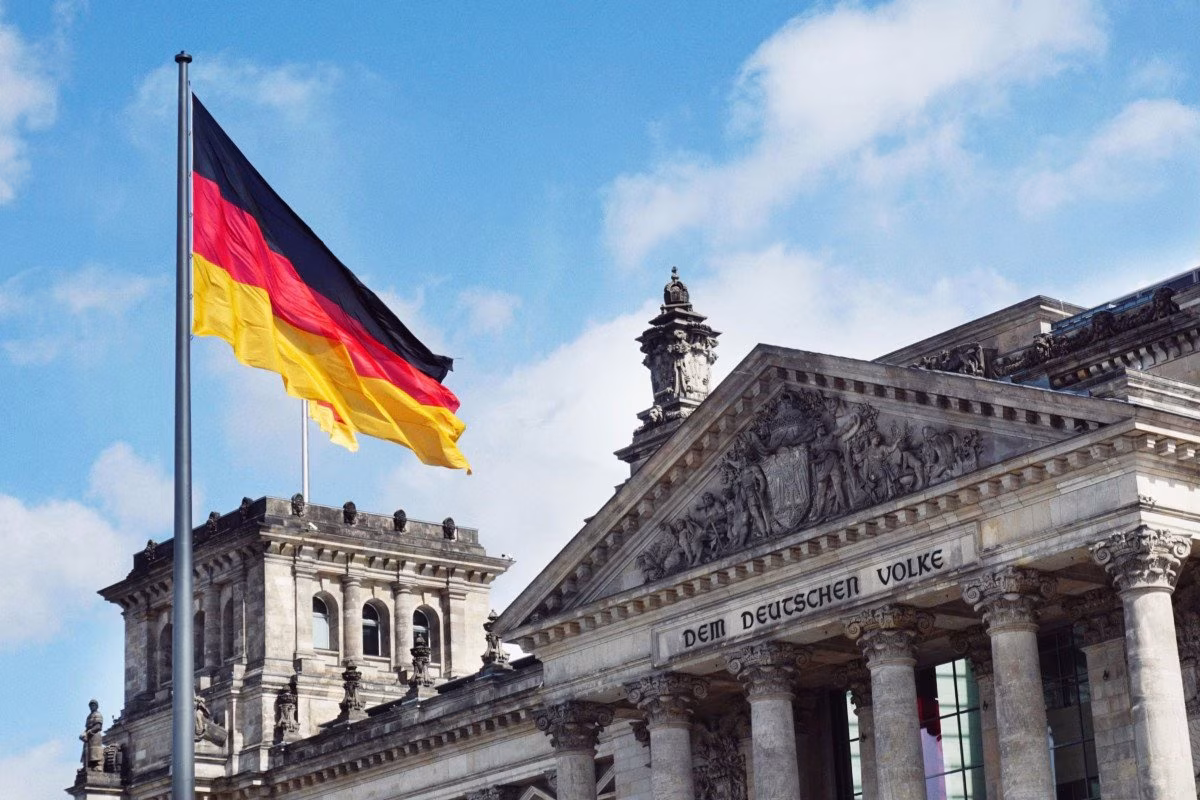 German flag flies in front of the Reichstag building in Berlin from Stockmark.it