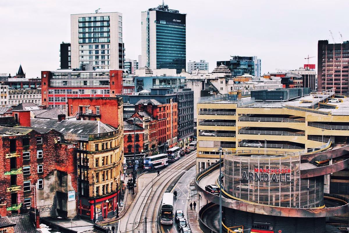Manchester city center with Arndale Centre, trams, and buses. from Stockmark.it